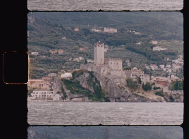 A castle on top of a mountain on the beach coast