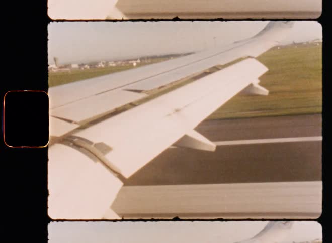 A plane landing on the airport runway