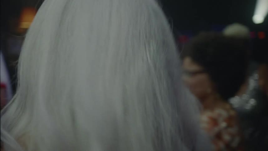 Elderly people dancing at a nightclub