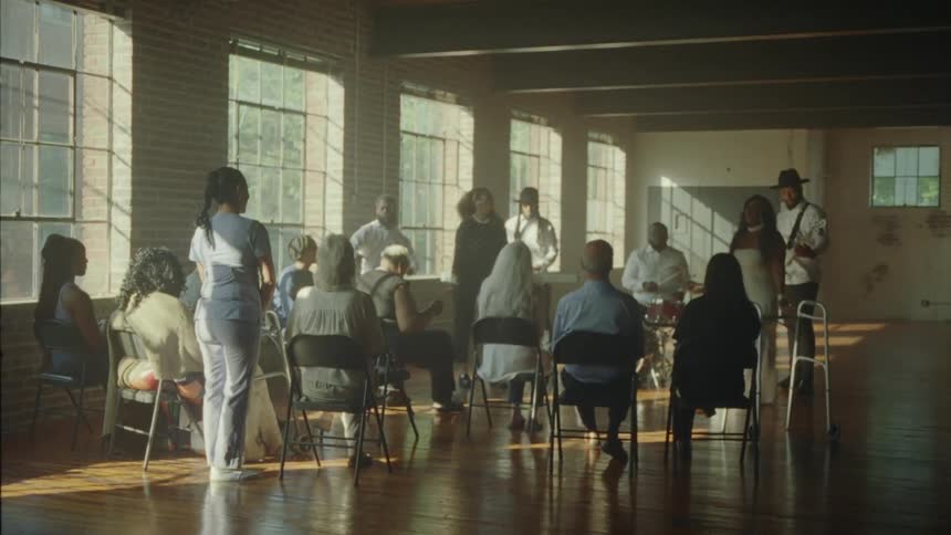 A band performing for a group of elderly people