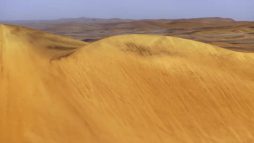 Sand dunes in a vast desert