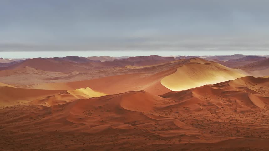 Aerial of large sand dunes in a desert