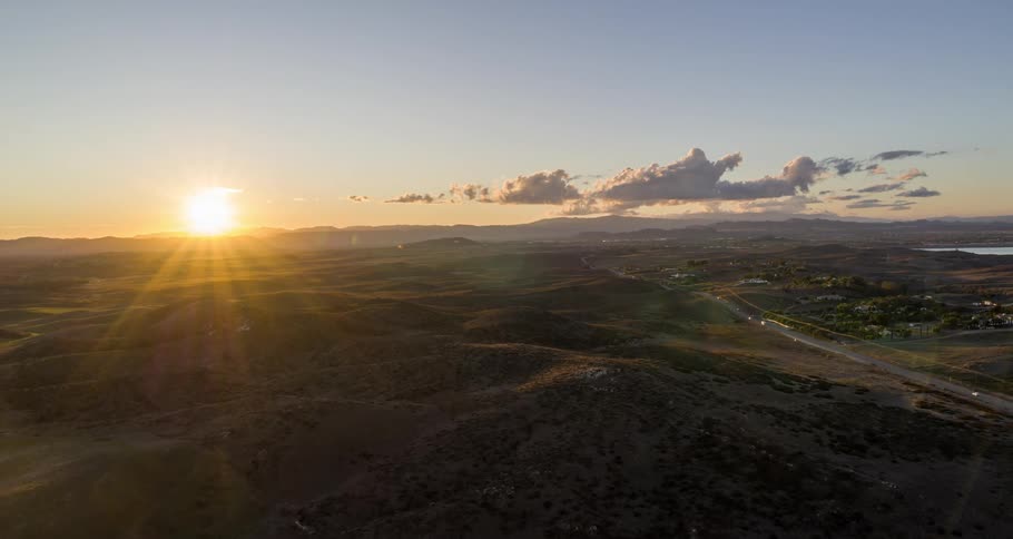 Aerial of hills in countryside during sunny morning