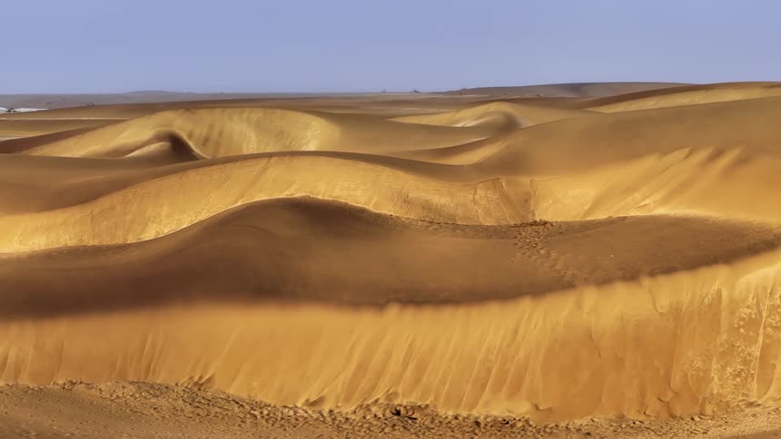 A region with hills and sand dunes