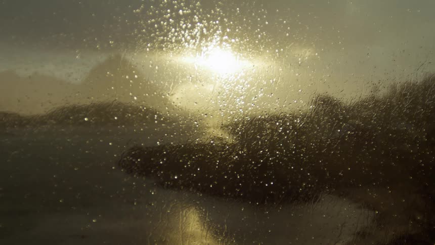 Glass fogged by rain during the day