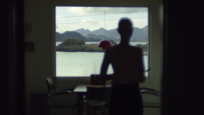 View from the apartment window facing the sea and mountains