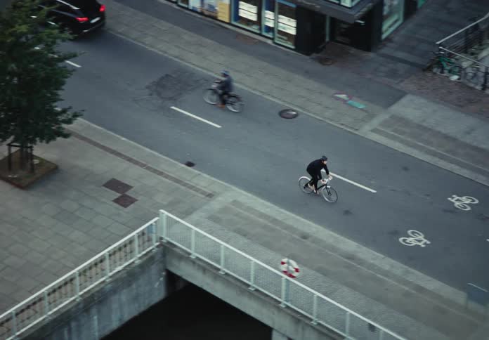Man riding a bicycle on a city street