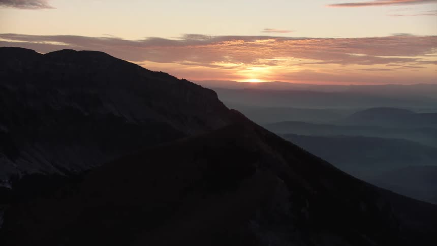 As the sun set a mountain view is in sight