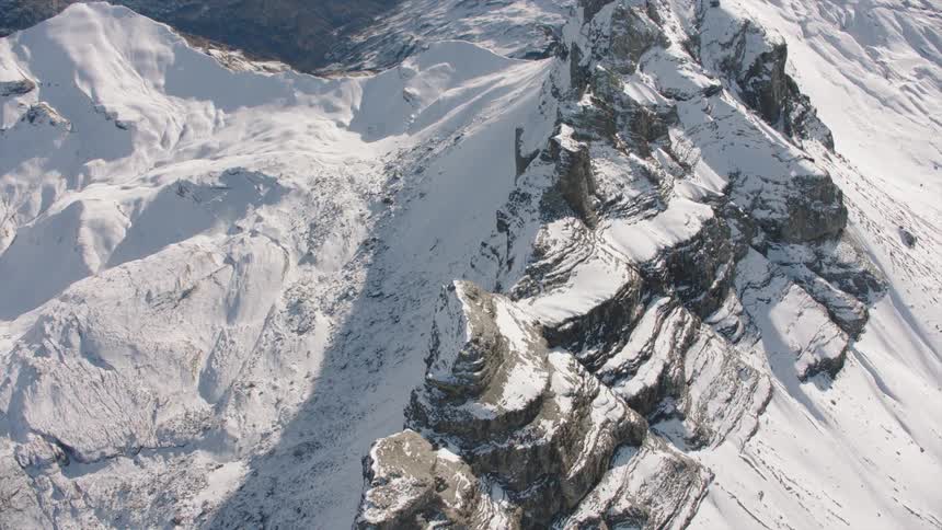 The mountains and its surrounding is covered in snow due to winter season