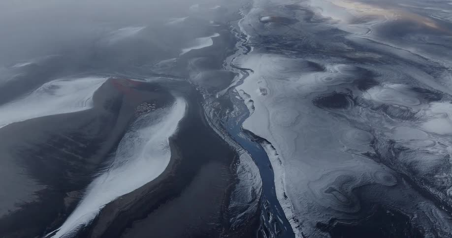 Aerial panorama of mountains in a landscape with a central river