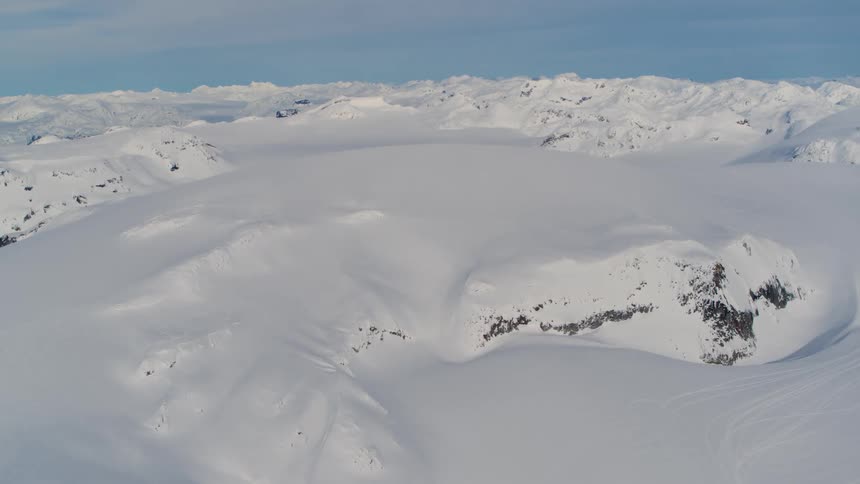 A natural region with the entire ground covered in dense snow