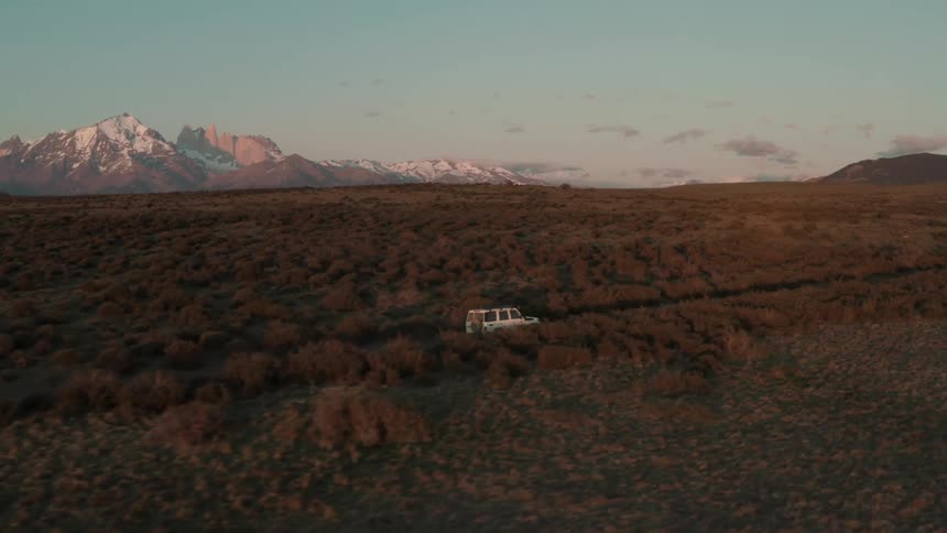 A vehicle is driving off road on the landscape