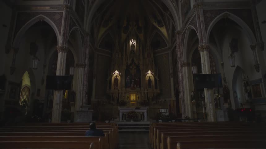 Interior of a church with artwork on its ceiling