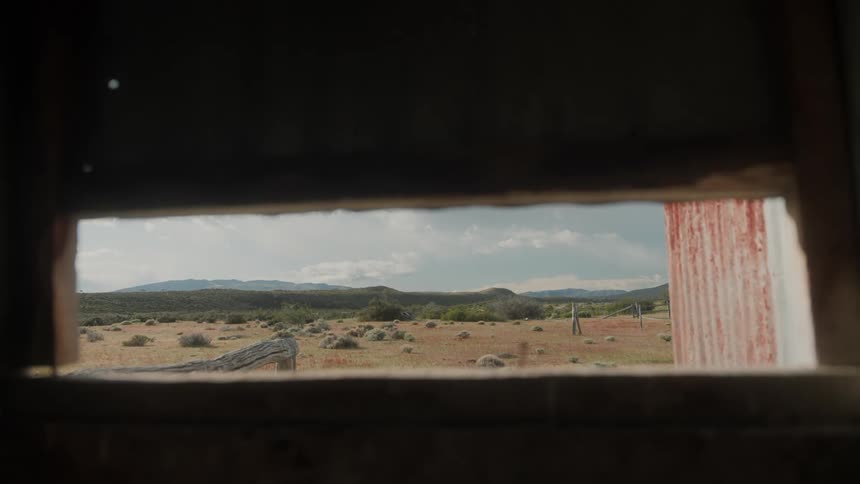 A view of the field from inside a cave