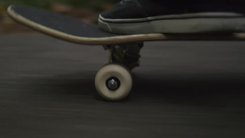 Skateboard wheel on the asphalt of the road
