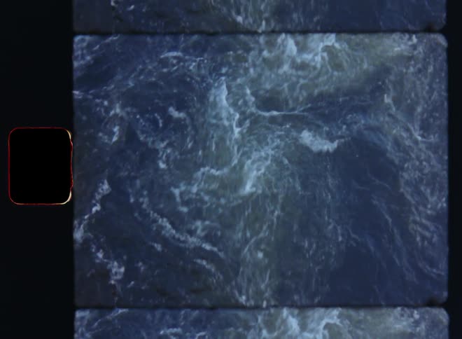 Aerial of choppy water with waves