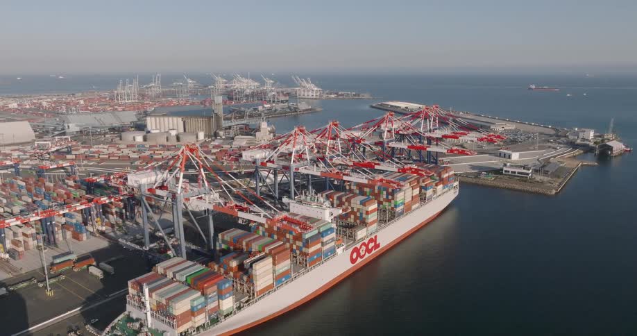 Skyline of the port area with ships with containers anchored at the docks