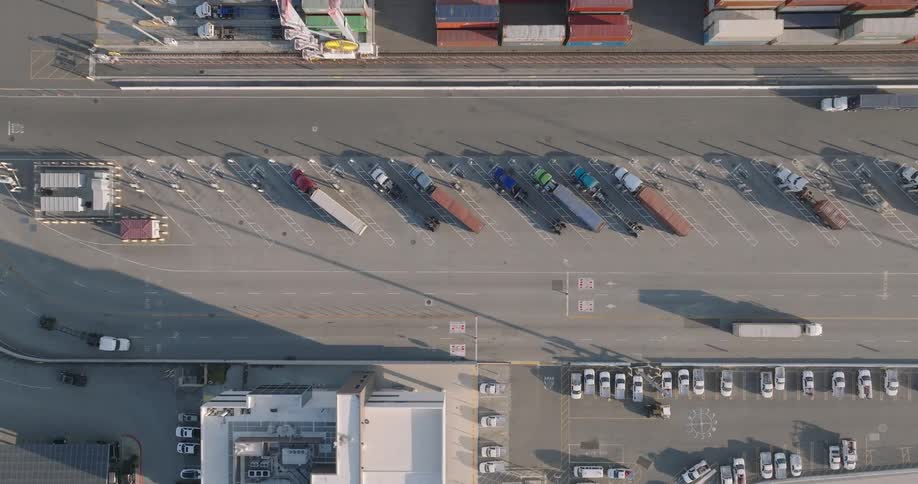 Aerial of trucks parked in a distribution area