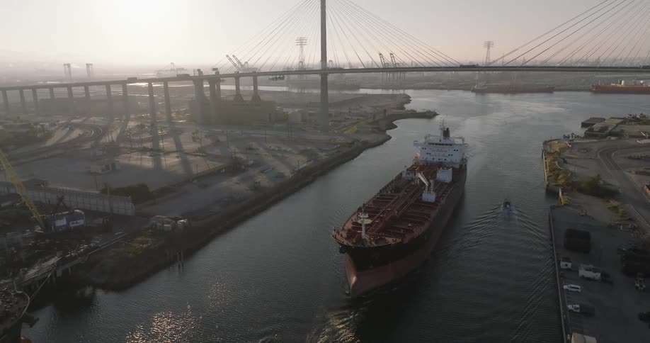 A cargo ship in the port of the metropolitan city