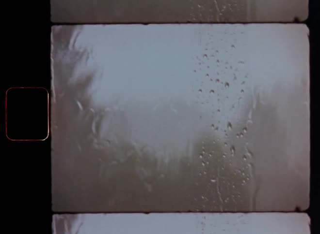 The rain is pouring on the window