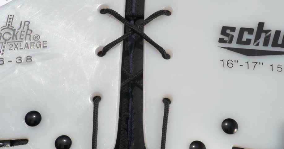 A shoulder pad is fastened