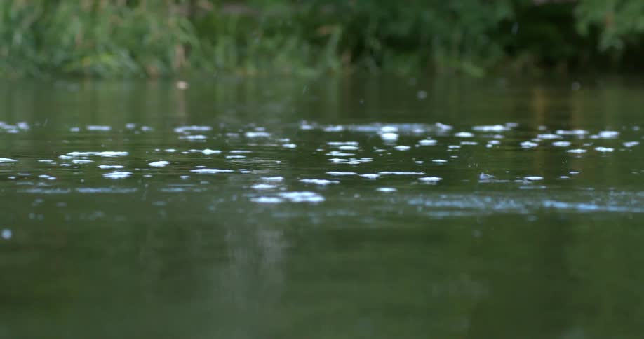 A rock is skipped across the water