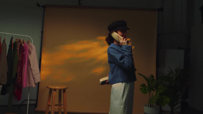 A woman is talking on the phone