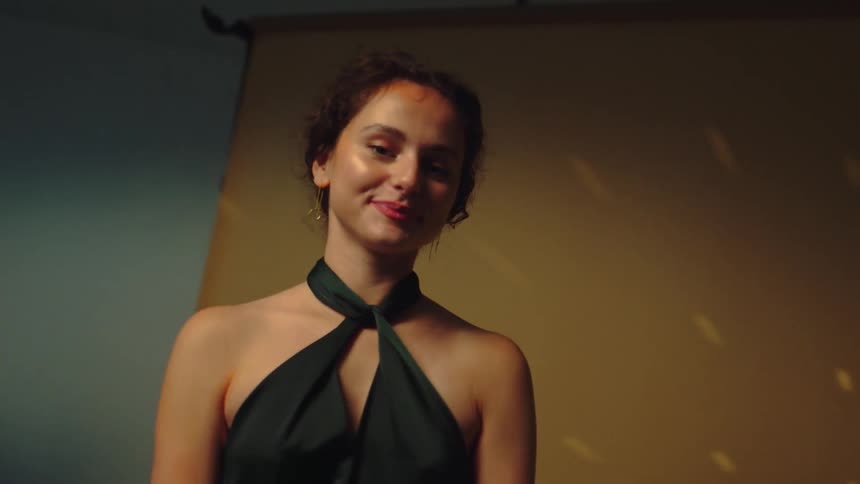 Woman modeling a night dress in the dressing room