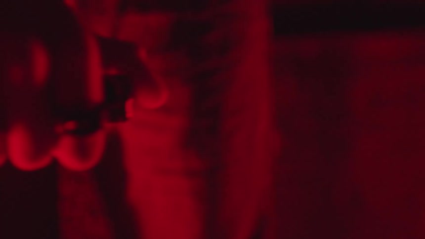 A person holding a lighter in their hands
