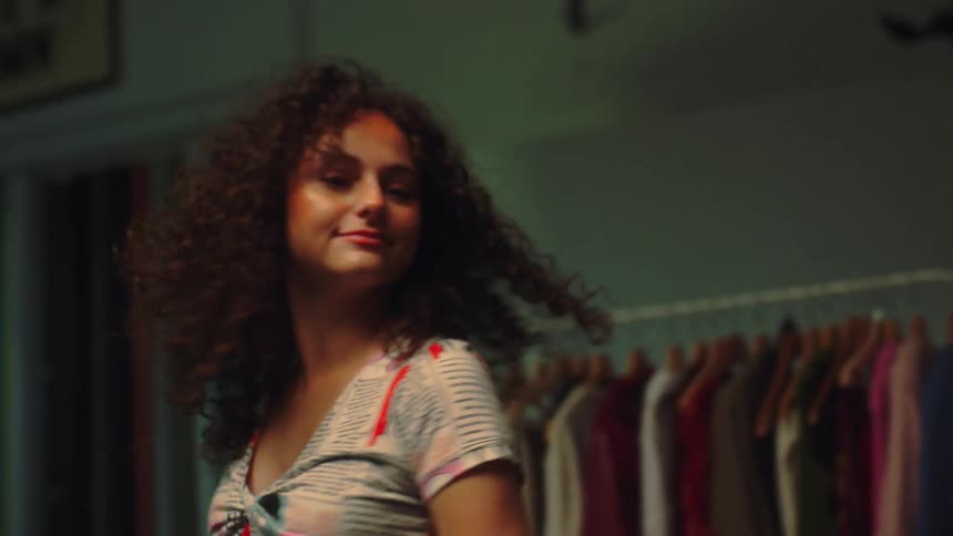 Woman modeling in a dressing room