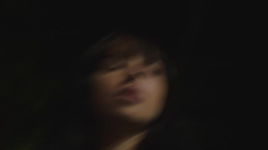 A lady wandering late in the night