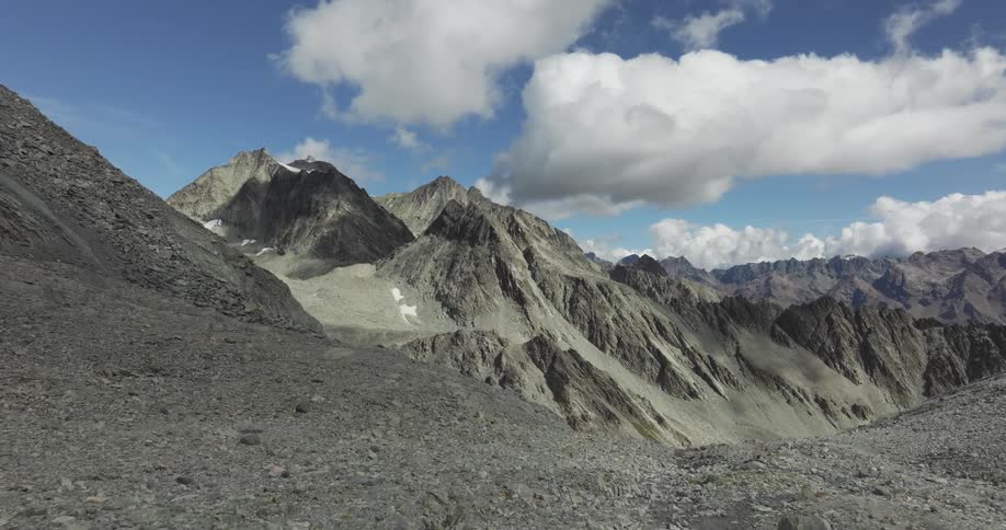 Two people enjoying the view in mountain peaks
