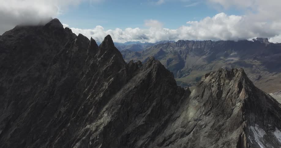 Aerial view of the peaks of a mountain range