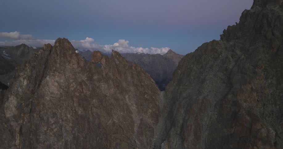 Aerial view of rugged mountains at dusk