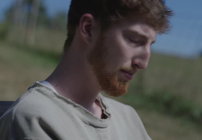 Profile of a young sad man thinking