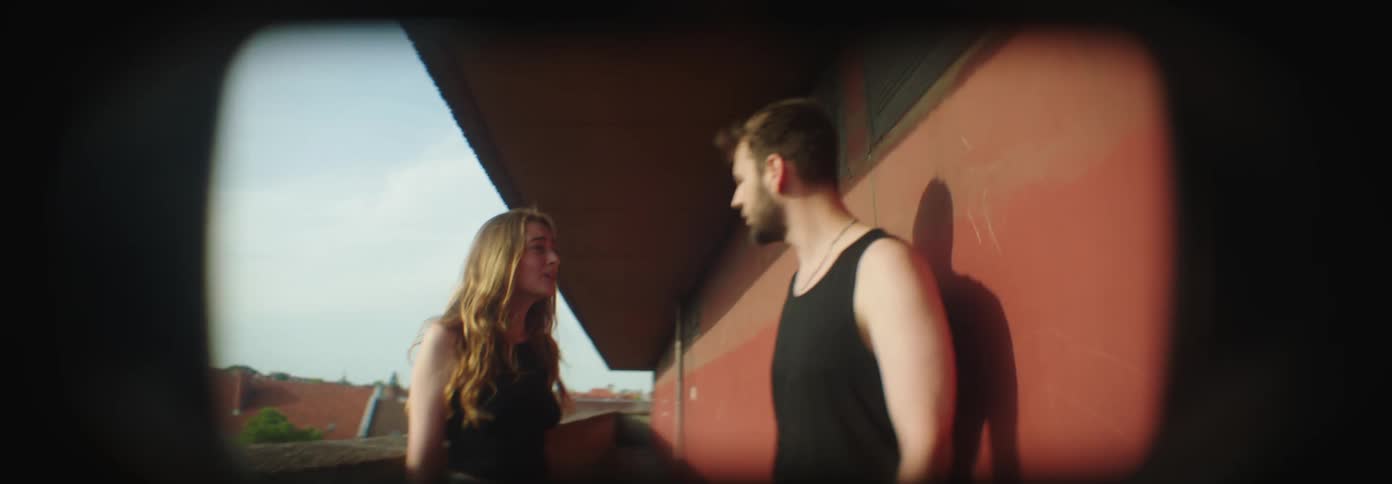 A couple have a heated argument and the woman pushes the man