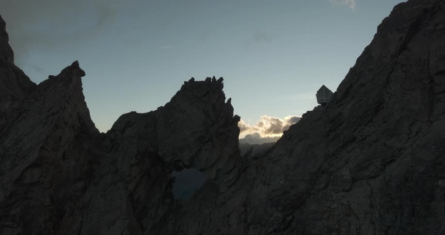 Aerial of mountain peak during sunset