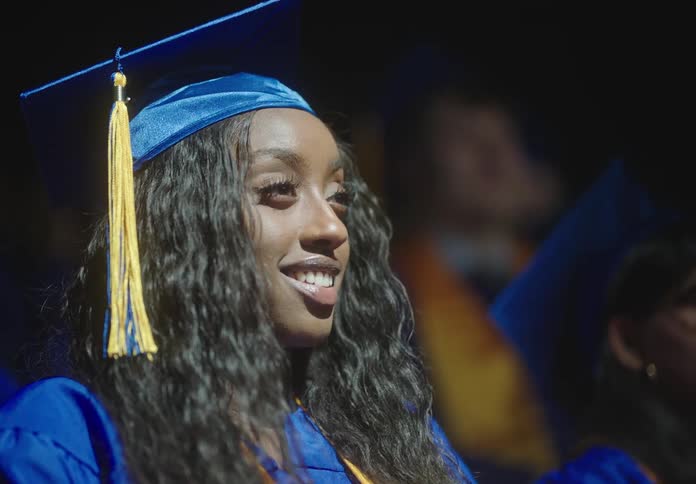 Surprised graduate student under the spotlight