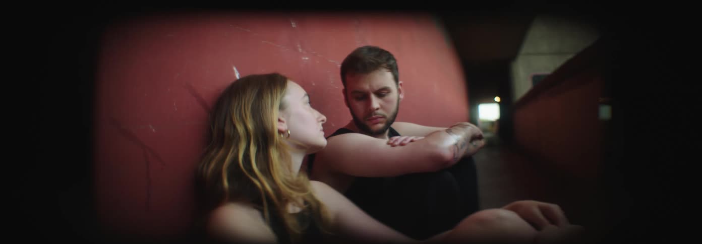 Two people sit on the terrace hall together