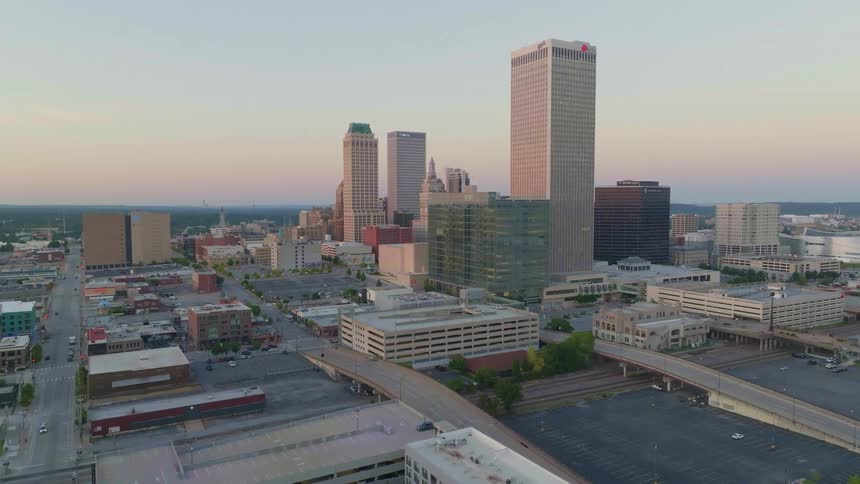View of buildings and streets in a metropolis with the morning sky