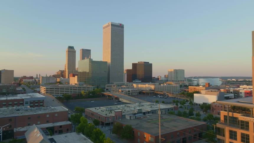 Landscape of buildings and skyscrapers in tulsa oklahoma at sunset