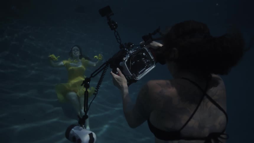 A photographer on an underwater photo shoot