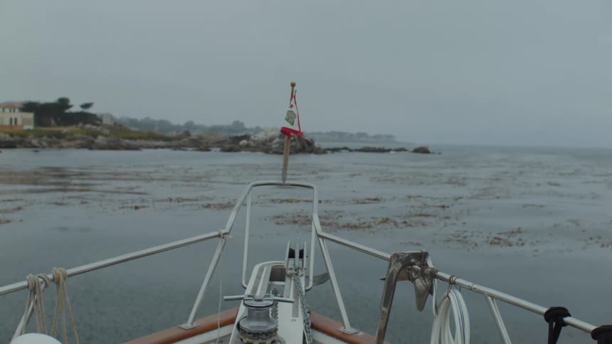 A bow of a boat offshore during the day