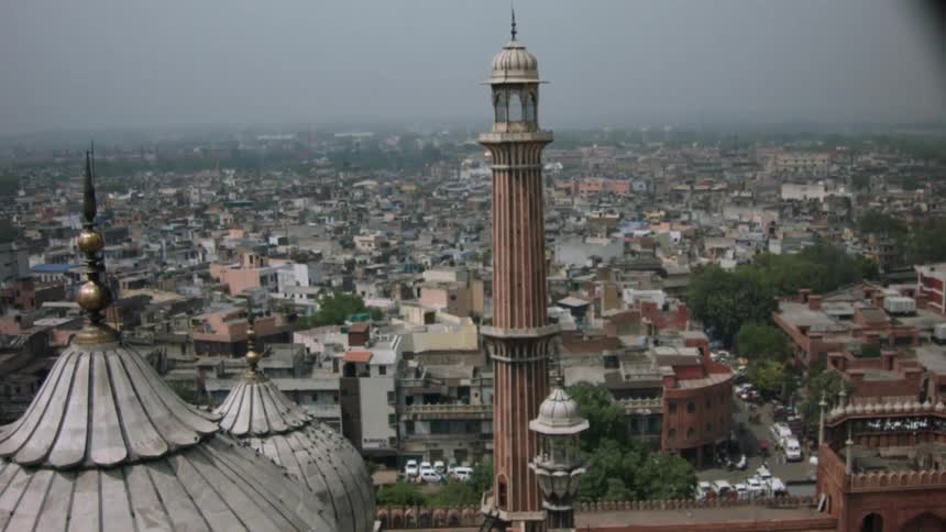 A tower sits before the city ahead