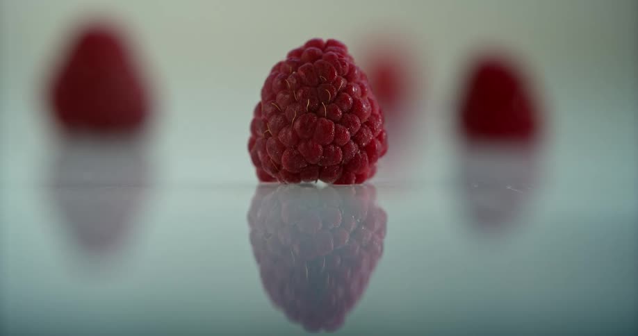 A time lapse of a raspberry reveals it freezing and forming ice