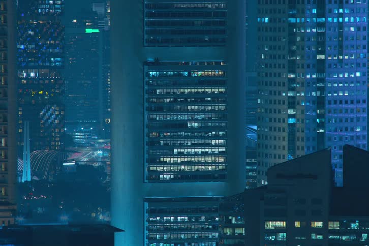 Buildings illuminated at night in the city