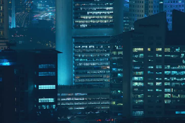 The lights in the building windows flash