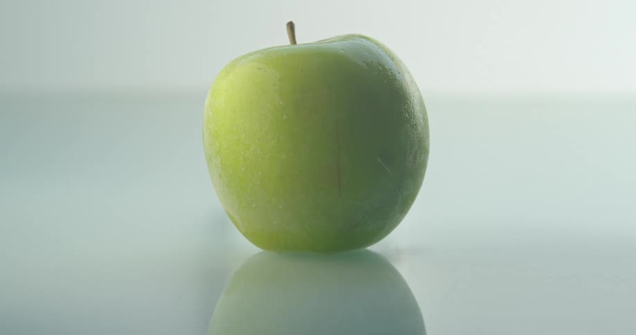 Green apple freezing in timelapse
