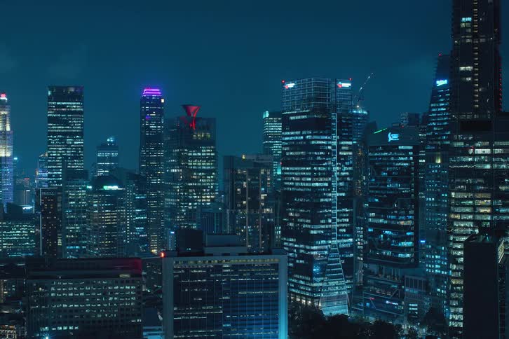 A time lapse of a city with apartment lights blinking