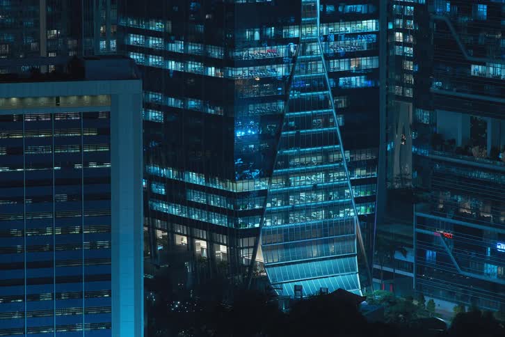 Time lapse of lights going on and off on a building in the city